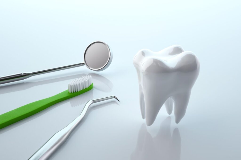 歯科のミラーと歯ブラシ